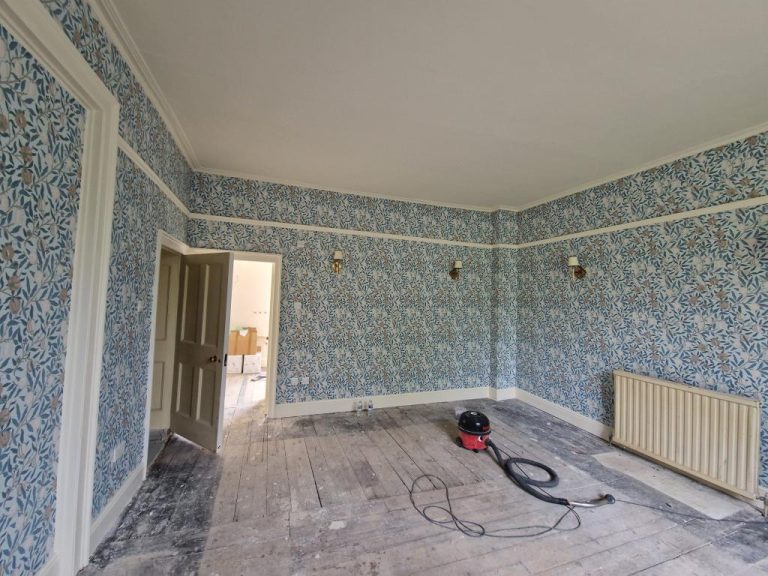 Professional wallpaper work in a home renovation