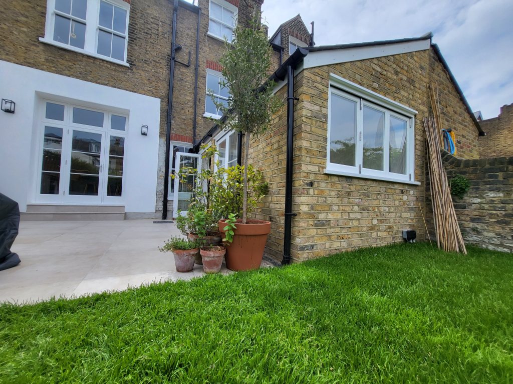Rear house extension with brickwork and patio at Victorian property refurbishment in Camberwell SE5