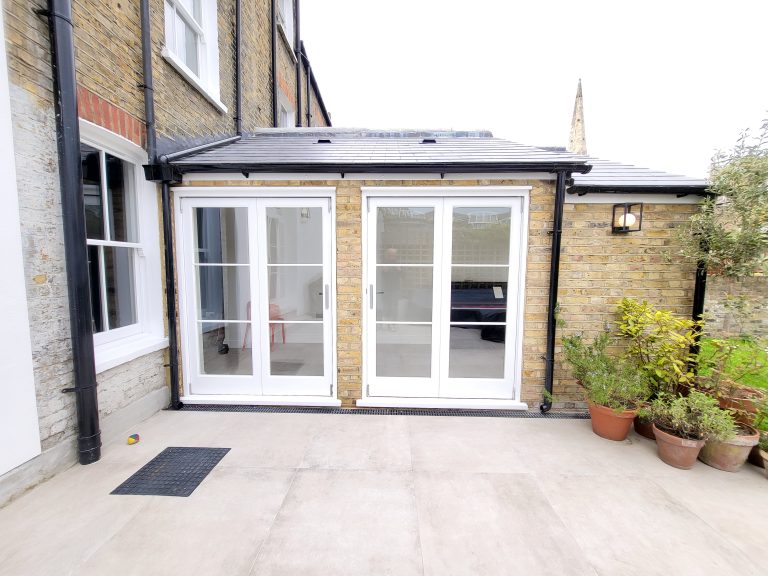 Rear kitchen extension with French doors at Victorian house renovation in Camberwell SE5