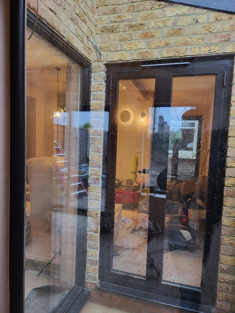 wraparound house extension Brockley SE4 bifold doors installation Lewisham builders construction stage