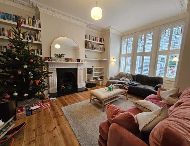 Home Renovations Living room renovation with painting and floor restoration